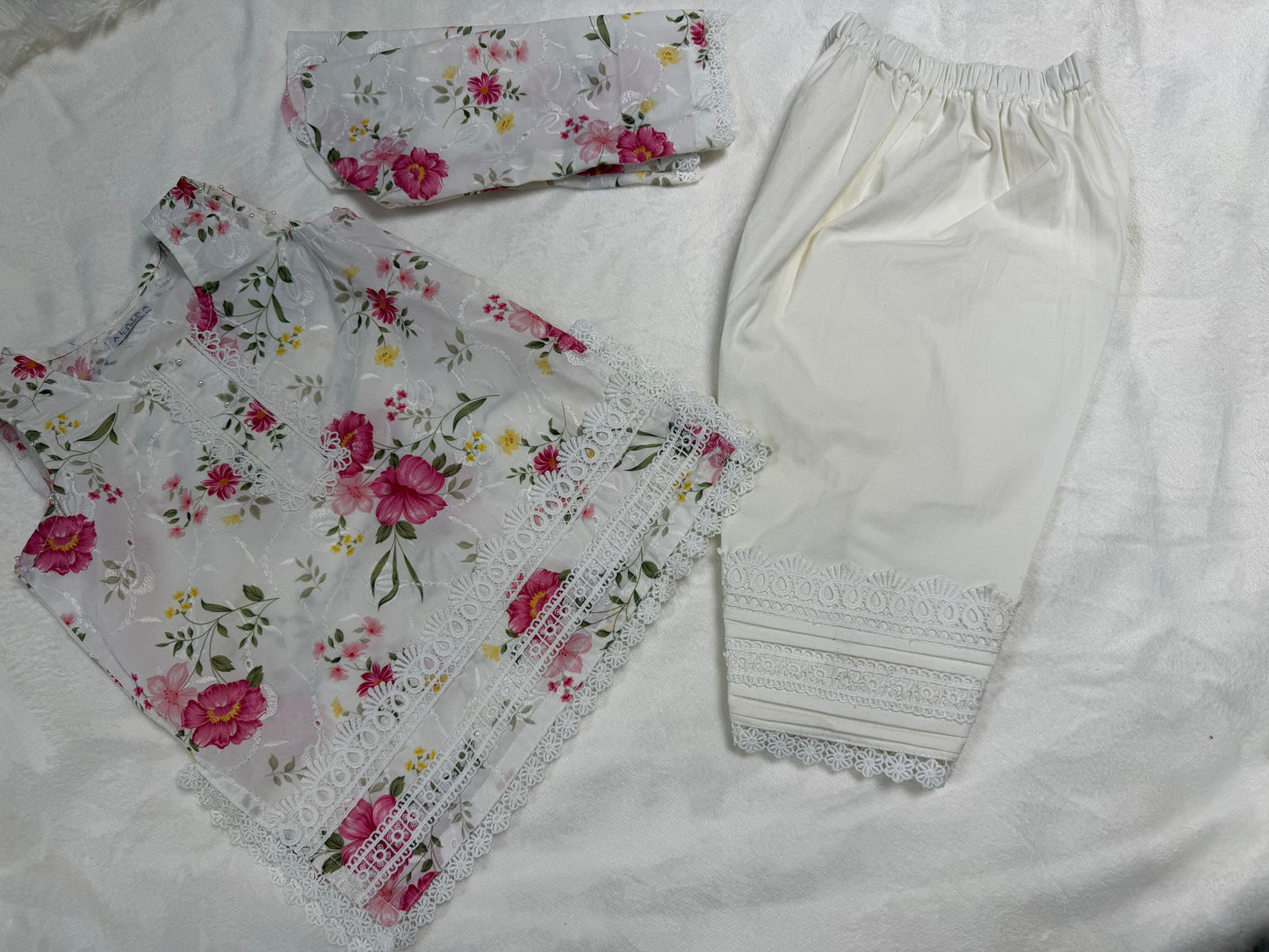 Close-up of intricate floral embroidery on White Floral Baby Girl Kurta Set - Pakistani baby clothes UK
